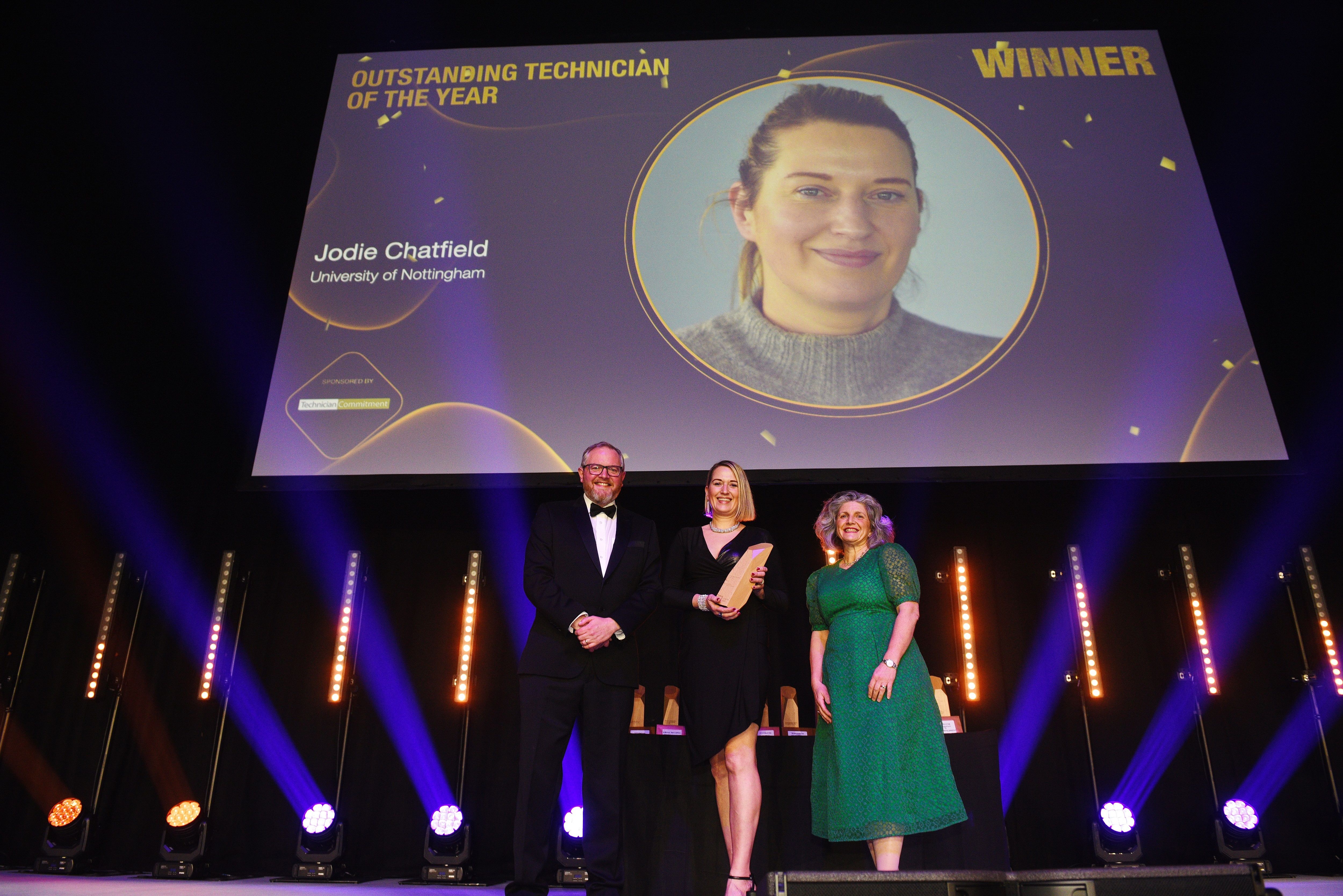 left to right: Miles Jupp (host), Jodie Chatfield (winner), Clare Viney (Technician Commitment Steering Board Chair)